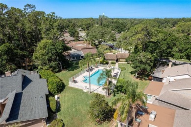 Welcome to your DREAM VILLA nestled in the sought after on Tarpon Woods Golf Club in Florida - for sale on GolfHomes.com, golf home, golf lot