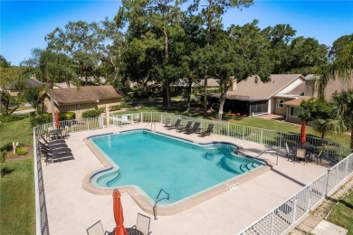 Welcome to your DREAM VILLA nestled in the sought after on Tarpon Woods Golf Club in Florida - for sale on GolfHomes.com, golf home, golf lot