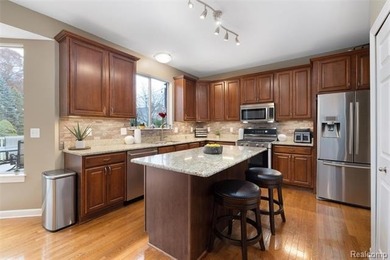 EXCLUSIVE BUYER INCENTIVE: SELLER TO PAY ONE (1) YEAR OF on Prestwick Village Golf Club in Michigan - for sale on GolfHomes.com, golf home, golf lot