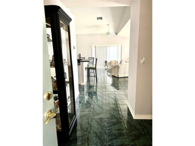 METICULOUSLY MAINTAINED 2 BEDROOM VILLA. END UNIT IN A PREMIER on Terra Ceia Golf and Country Club in Florida - for sale on GolfHomes.com, golf home, golf lot