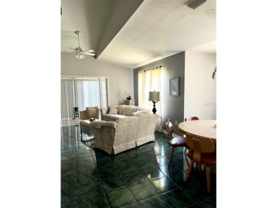 METICULOUSLY MAINTAINED 2 BEDROOM VILLA. END UNIT IN A PREMIER on Terra Ceia Golf and Country Club in Florida - for sale on GolfHomes.com, golf home, golf lot
