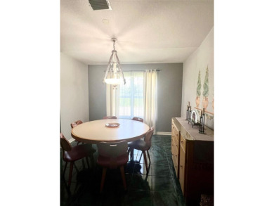 METICULOUSLY MAINTAINED 2 BEDROOM VILLA. END UNIT IN A PREMIER on Terra Ceia Golf and Country Club in Florida - for sale on GolfHomes.com, golf home, golf lot