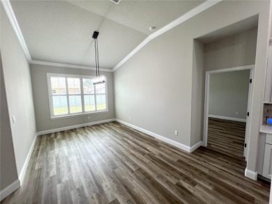 Built in 2023! This 4 bedroom, 3 bathroom, 3 car garage home has on The Grand Club - Pine Lakes Course in Florida - for sale on GolfHomes.com, golf home, golf lot