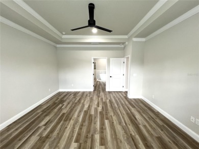 Built in 2023! This 4 bedroom, 3 bathroom, 3 car garage home has on The Grand Club - Pine Lakes Course in Florida - for sale on GolfHomes.com, golf home, golf lot