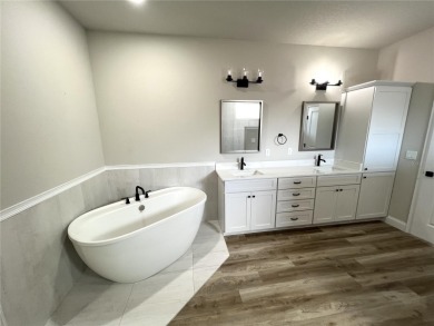 Built in 2023! This 4 bedroom, 3 bathroom, 3 car garage home has on The Grand Club - Pine Lakes Course in Florida - for sale on GolfHomes.com, golf home, golf lot