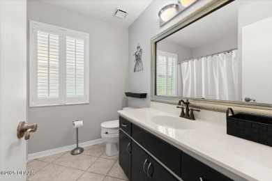 Experience vibrant waterfront living in this exceptionally on The Club At Pelican Bay - North Course in Florida - for sale on GolfHomes.com, golf home, golf lot