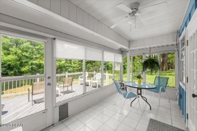Experience vibrant waterfront living in this exceptionally on The Club At Pelican Bay - North Course in Florida - for sale on GolfHomes.com, golf home, golf lot