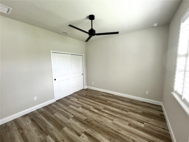 Built in 2023! This 4 bedroom, 3 bathroom, 3 car garage home has on The Grand Club - Pine Lakes Course in Florida - for sale on GolfHomes.com, golf home, golf lot