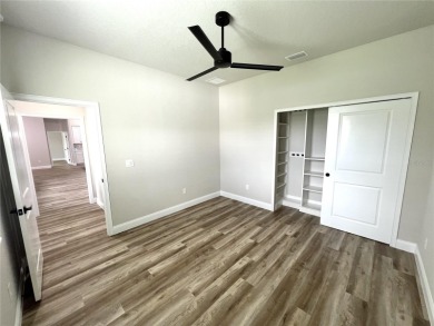 Built in 2023! This 4 bedroom, 3 bathroom, 3 car garage home has on The Grand Club - Pine Lakes Course in Florida - for sale on GolfHomes.com, golf home, golf lot