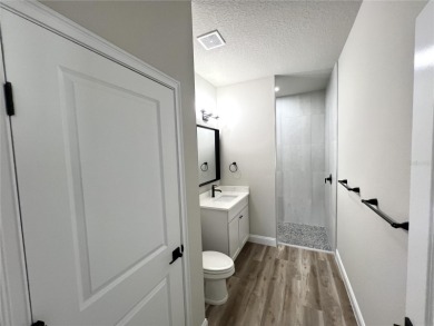 Built in 2023! This 4 bedroom, 3 bathroom, 3 car garage home has on The Grand Club - Pine Lakes Course in Florida - for sale on GolfHomes.com, golf home, golf lot