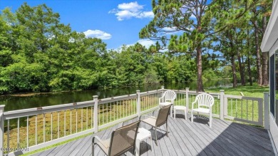Experience vibrant waterfront living in this exceptionally on The Club At Pelican Bay - North Course in Florida - for sale on GolfHomes.com, golf home, golf lot