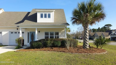 From the moment you step inside this sun-filled end-unit on Belvedere Country Club in North Carolina - for sale on GolfHomes.com, golf home, golf lot