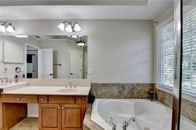 Welcome to this beautifully maintained 5-bedroom, 3-bath home on Hamilton Mill Golf Club in Georgia - for sale on GolfHomes.com, golf home, golf lot