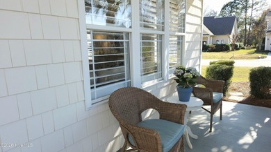 From the moment you step inside this sun-filled end-unit on Belvedere Country Club in North Carolina - for sale on GolfHomes.com, golf home, golf lot
