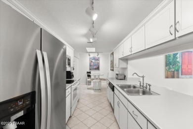 Experience vibrant waterfront living in this exceptionally on The Club At Pelican Bay - North Course in Florida - for sale on GolfHomes.com, golf home, golf lot