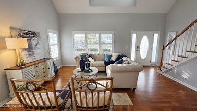 From the moment you step inside this sun-filled end-unit on Belvedere Country Club in North Carolina - for sale on GolfHomes.com, golf home, golf lot