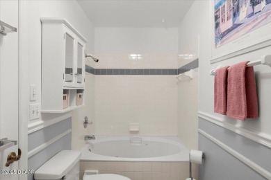 Experience vibrant waterfront living in this exceptionally on The Club At Pelican Bay - North Course in Florida - for sale on GolfHomes.com, golf home, golf lot