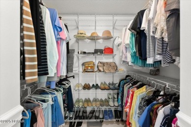 Experience vibrant waterfront living in this exceptionally on The Club At Pelican Bay - North Course in Florida - for sale on GolfHomes.com, golf home, golf lot