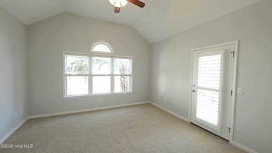 From the moment you step inside this sun-filled end-unit on Belvedere Country Club in North Carolina - for sale on GolfHomes.com, golf home, golf lot