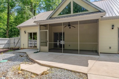 Tucked beside a quiet creek and backing up to The Rock Golf Club on The Rock At Jocassee in South Carolina - for sale on GolfHomes.com, golf home, golf lot