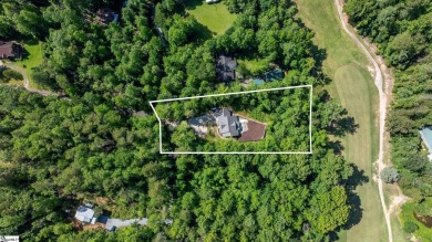 Tucked beside a quiet creek and backing up to The Rock Golf Club on The Rock At Jocassee in South Carolina - for sale on GolfHomes.com, golf home, golf lot