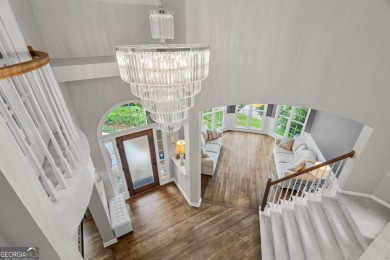ELEVATED LUXURY MEETS EVERYDAY COMFORT! Professionally upgraded on Sugar Hill Golf Club in Georgia - for sale on GolfHomes.com, golf home, golf lot