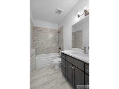 Stunning Custom Home in Rigby Golf Course Community! This on Jefferson Hills Golf Course in Idaho - for sale on GolfHomes.com, golf home, golf lot