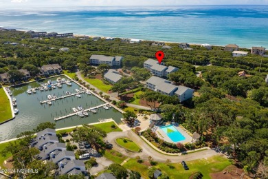 This 2-bedroom, 2-bath, second floor furnished condo in the on The Country Club of the Crystal Coast in North Carolina - for sale on GolfHomes.com, golf home, golf lot