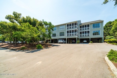 This 2-bedroom, 2-bath, second floor furnished condo in the on The Country Club of the Crystal Coast in North Carolina - for sale on GolfHomes.com, golf home, golf lot