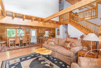 NO DAMAGE FROM HELENE-HIGH  DRY. This warm and inviting log home on Waynesville Country Club Inn in North Carolina - for sale on GolfHomes.com, golf home, golf lot