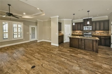 THIS SPACIOUS FOUR-BEDROOM HOME OFFERS OVER 2,700 SQUARE FEET OF on Laurel Island Links in Georgia - for sale on GolfHomes.com, golf home, golf lot