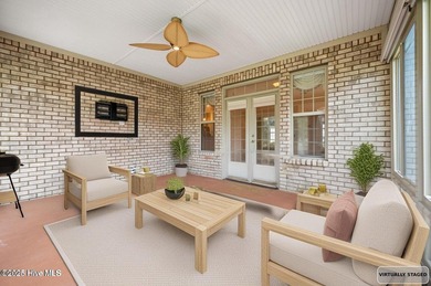 Welcome to your beautiful brick home overlooking a peaceful pond on Cape Fear National At Brunswick Forest in North Carolina - for sale on GolfHomes.com, golf home, golf lot