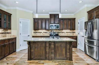 THIS SPACIOUS FOUR-BEDROOM HOME OFFERS OVER 2,700 SQUARE FEET OF on Laurel Island Links in Georgia - for sale on GolfHomes.com, golf home, golf lot