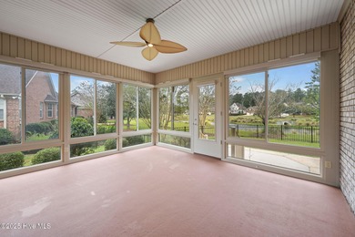 Welcome to your beautiful brick home overlooking a peaceful pond on Cape Fear National At Brunswick Forest in North Carolina - for sale on GolfHomes.com, golf home, golf lot