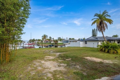 This is the one you've been waiting for -- 66 feet of waterfront on Gulf Harbors Golf Course in Florida - for sale on GolfHomes.com, golf home, golf lot