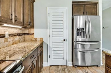 THIS SPACIOUS FOUR-BEDROOM HOME OFFERS OVER 2,700 SQUARE FEET OF on Laurel Island Links in Georgia - for sale on GolfHomes.com, golf home, golf lot