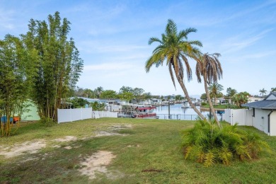This is the one you've been waiting for -- 66 feet of waterfront on Gulf Harbors Golf Course in Florida - for sale on GolfHomes.com, golf home, golf lot