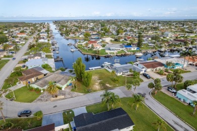 This is the one you've been waiting for -- 66 feet of waterfront on Gulf Harbors Golf Course in Florida - for sale on GolfHomes.com, golf home, golf lot