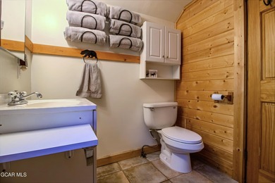 Step into a piece of history with this charming log cabin on Grand Lake Golf Course in Colorado - for sale on GolfHomes.com, golf home, golf lot