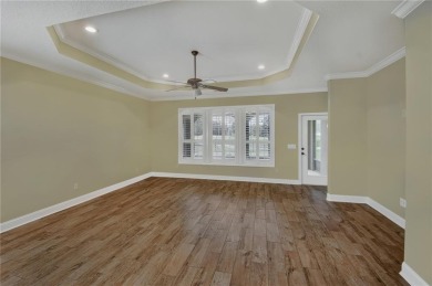 THIS SPACIOUS FOUR-BEDROOM HOME OFFERS OVER 2,700 SQUARE FEET OF on Laurel Island Links in Georgia - for sale on GolfHomes.com, golf home, golf lot
