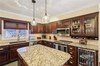 Looking for a family friendly home and community? Meticulously on Lakewood Oaks Golf Club, Ltd. in Missouri - for sale on GolfHomes.com, golf home, golf lot