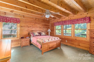 NO DAMAGE FROM HELENE-HIGH  DRY. This warm and inviting log home on Waynesville Country Club Inn in North Carolina - for sale on GolfHomes.com, golf home, golf lot