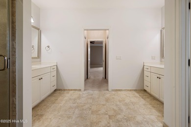 Welcome to your beautiful brick home overlooking a peaceful pond on Cape Fear National At Brunswick Forest in North Carolina - for sale on GolfHomes.com, golf home, golf lot