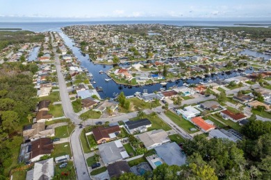 This is the one you've been waiting for -- 66 feet of waterfront on Gulf Harbors Golf Course in Florida - for sale on GolfHomes.com, golf home, golf lot