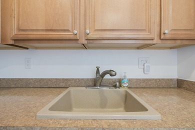 Second-floor 2 bed / 2 bath condo with garden views in the on Kings Point Golf -Flanders Way in Florida - for sale on GolfHomes.com, golf home, golf lot