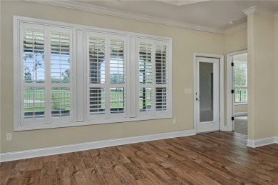 THIS SPACIOUS FOUR-BEDROOM HOME OFFERS OVER 2,700 SQUARE FEET OF on Laurel Island Links in Georgia - for sale on GolfHomes.com, golf home, golf lot