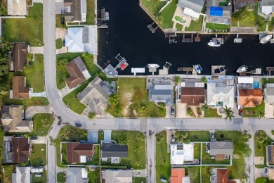 This is the one you've been waiting for -- 66 feet of waterfront on Gulf Harbors Golf Course in Florida - for sale on GolfHomes.com, golf home, golf lot