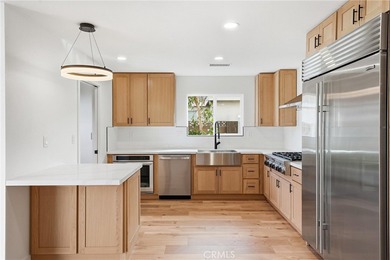 Absolute stunning single level home in the heart of the Land of on Black Gold Golf Course in California - for sale on GolfHomes.com, golf home, golf lot