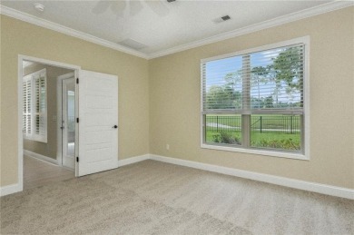 THIS SPACIOUS FOUR-BEDROOM HOME OFFERS OVER 2,700 SQUARE FEET OF on Laurel Island Links in Georgia - for sale on GolfHomes.com, golf home, golf lot