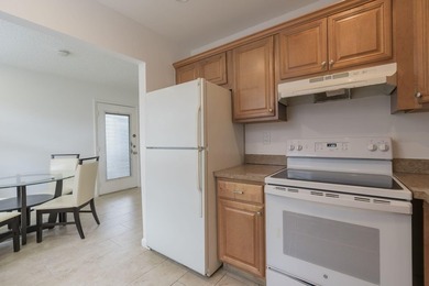 Second-floor 2 bed / 2 bath condo with garden views in the on Kings Point Golf -Flanders Way in Florida - for sale on GolfHomes.com, golf home, golf lot